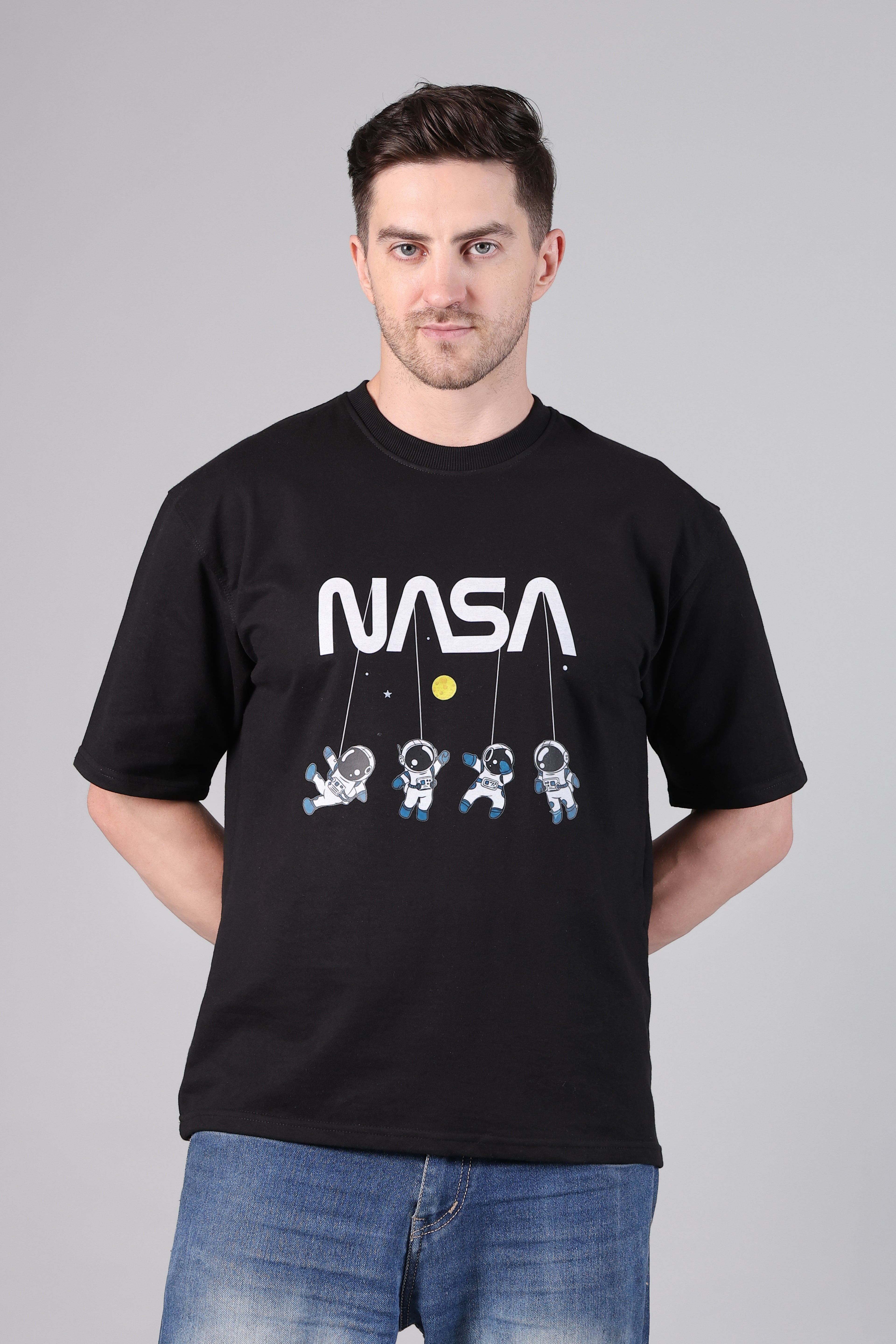 Men's Black Loose Fit Tee with NASA Logo and Floating Astronaut Print
