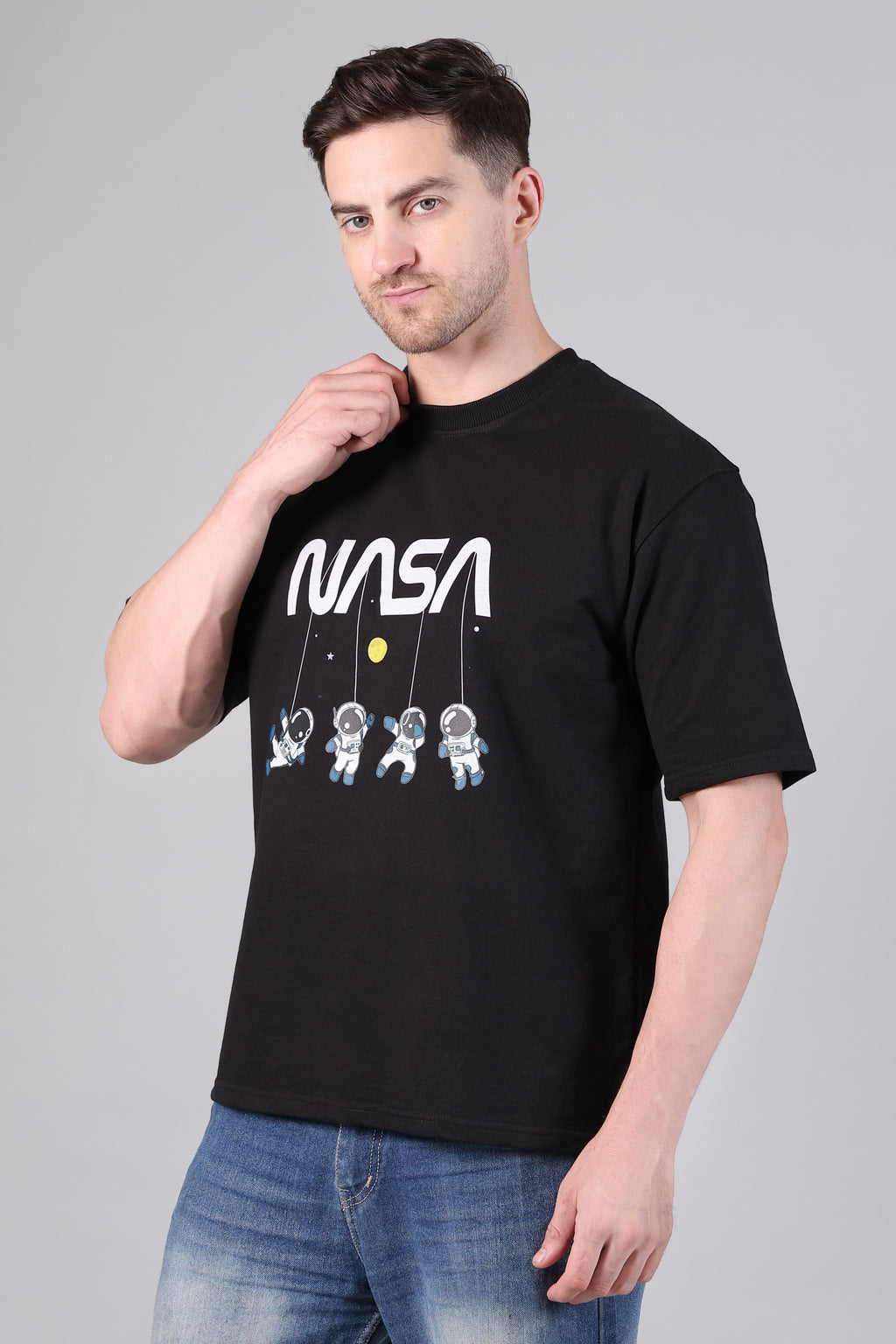 Men's Black Loose Fit Tee with NASA Logo and Floating Astronaut Print