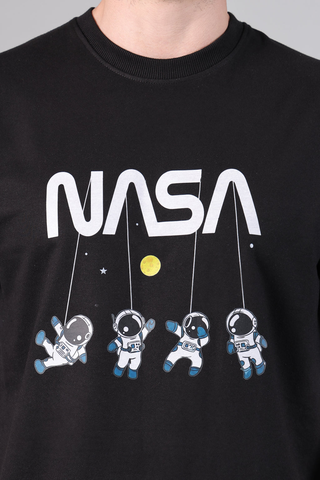 Men's Black Loose Fit Tee with NASA Logo and Floating Astronaut Print